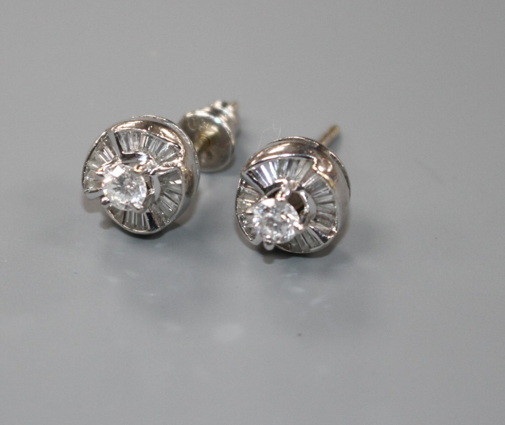 A pair of modern 18ct white gold and diamond cluster earstuds.